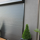 roller shutters on entrance to industrial building